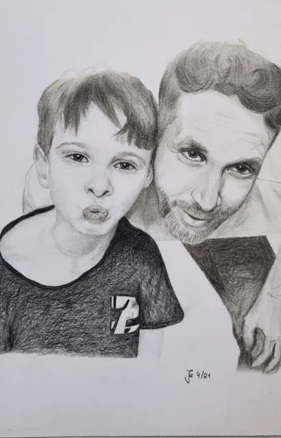 Vater und Sohn mit Buntstiften gezeichnet
